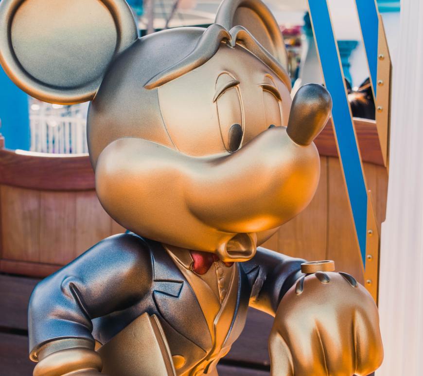 golden mickey looking at his watch distraught
