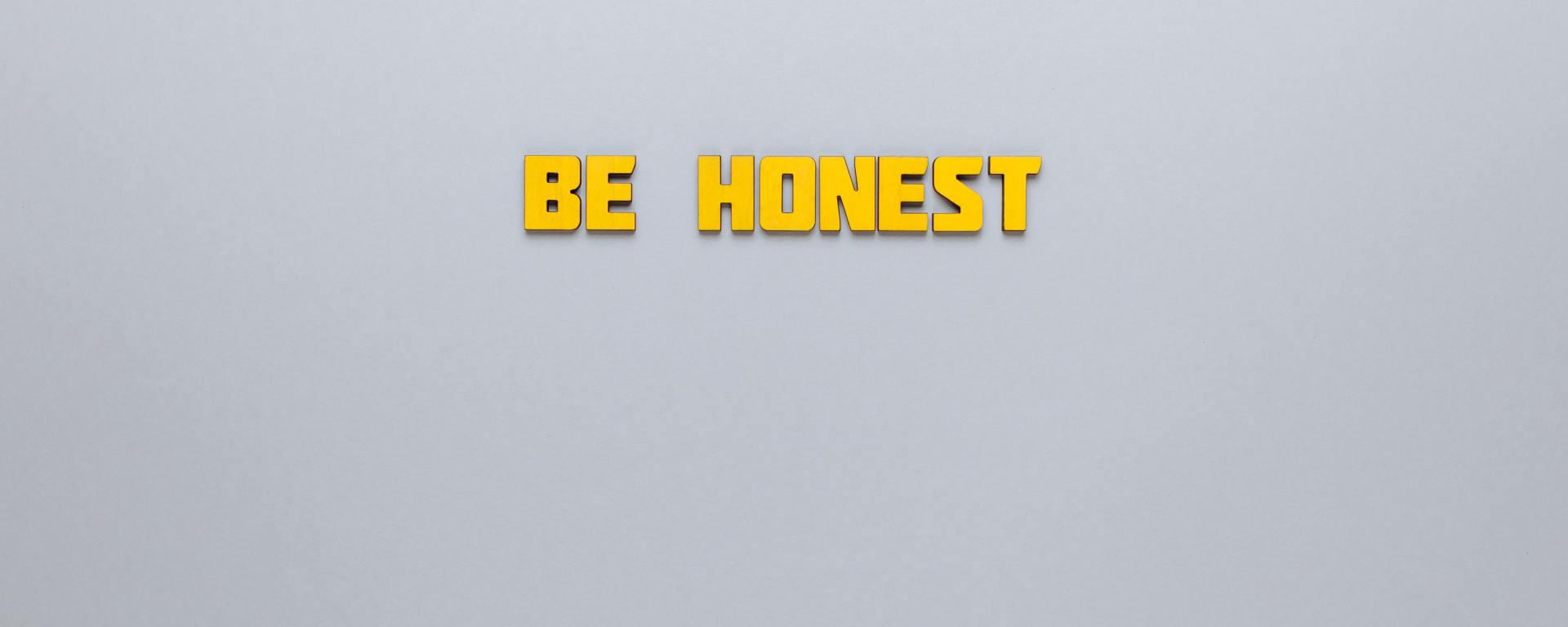 white background with yellow text that says "be honest"