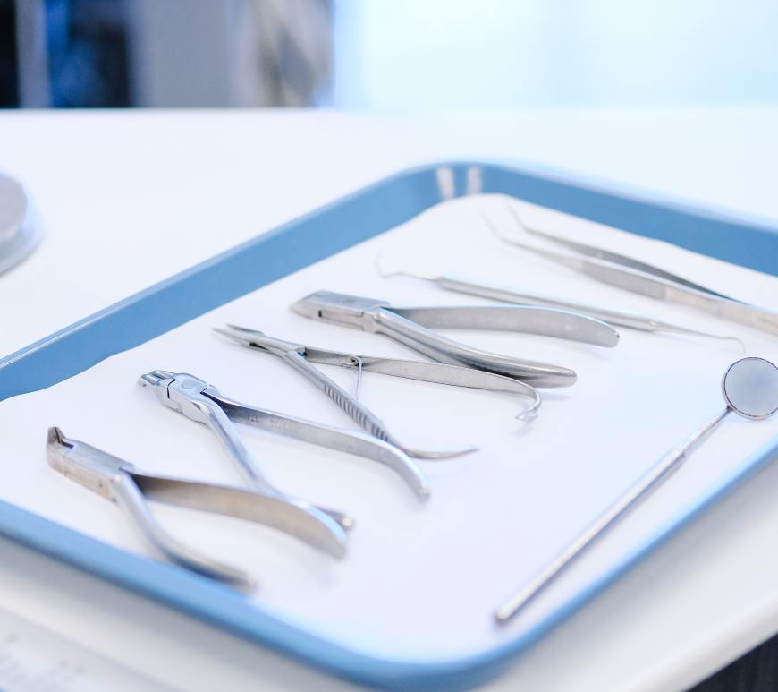 dental instruments on a plastic tray
